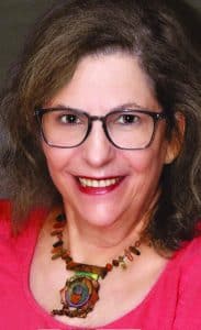 Headshot of woman honored for her work creating housing.