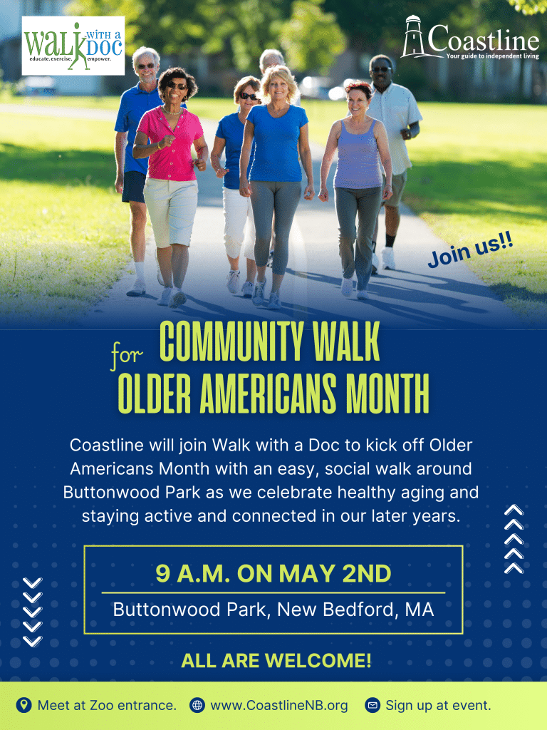 A group of older men and women walk through a park on a sunny day.